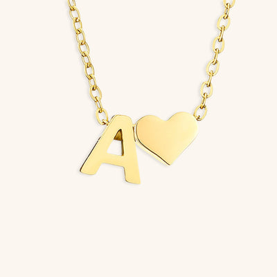 navnesmykke med initialen Ria | 18k Guld