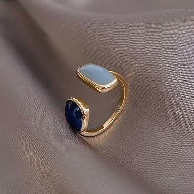 Elegant åbent ring med safir