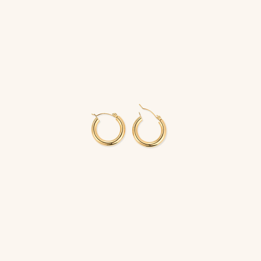 Elegante brede runde øreringe | 18k guld