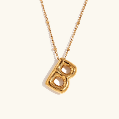 Næseørering med initialer i bobleform | Guld 18k