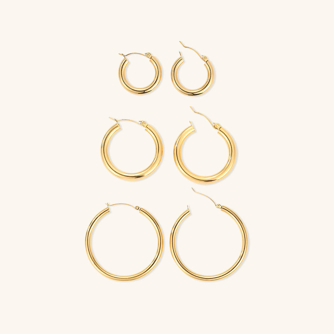 Elegante brede runde øreringe | 18k guld
