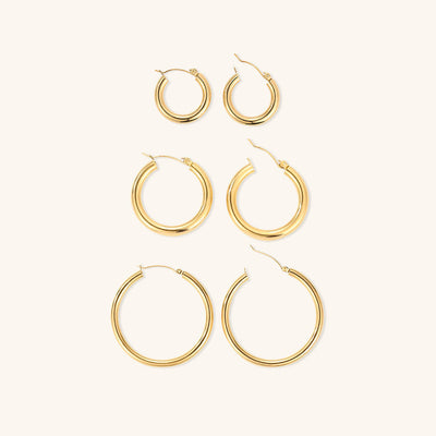 Elegante brede runde øreringe | 18k guld