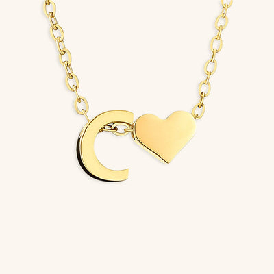 navnesmykke med initialen Ria | 18k Guld