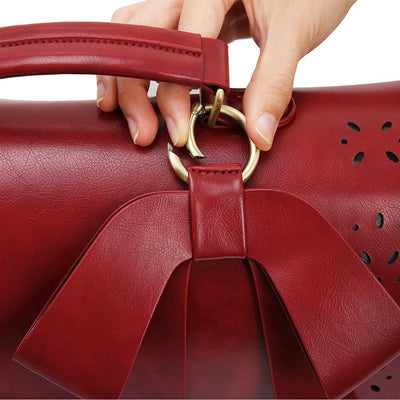 Monikas elegante sløjfetasker