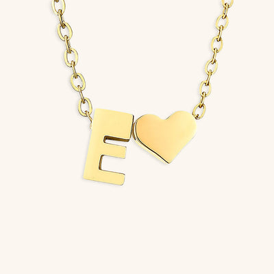 navnesmykke med initialen Ria | 18k Guld