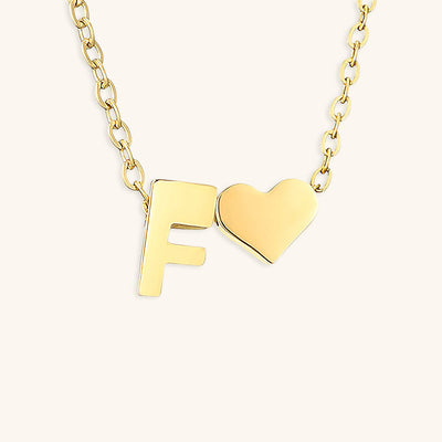 navnesmykke med initialen Ria | 18k Guld
