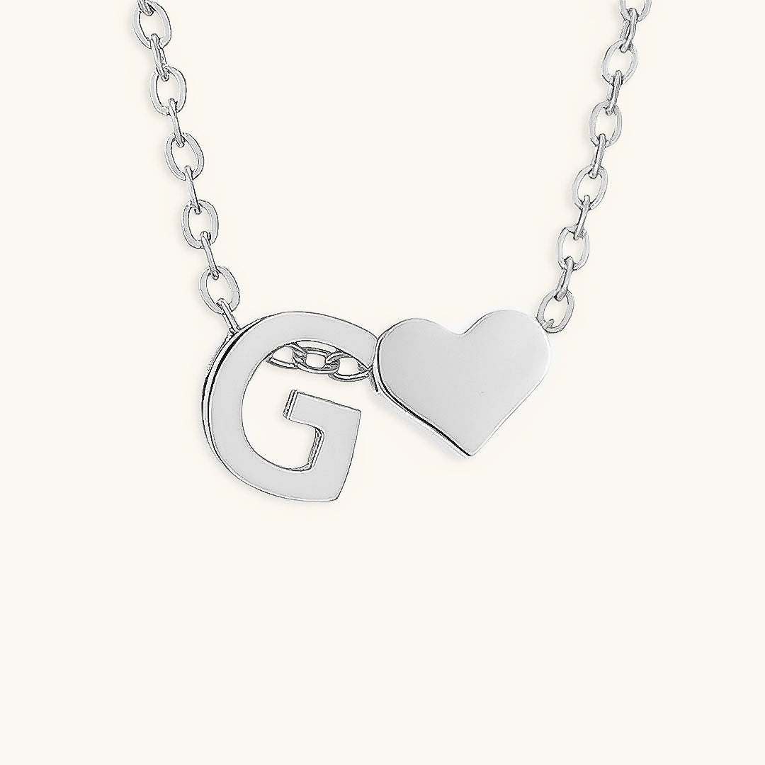 navnesmykke med initialen Ria | 18k Guld