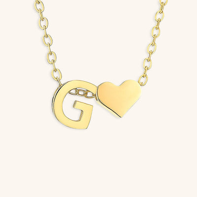 navnesmykke med initialen Ria | 18k Guld