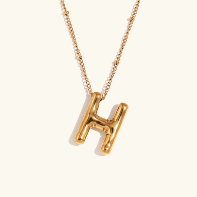 Næseørering med initialer i bobleform | Guld 18k