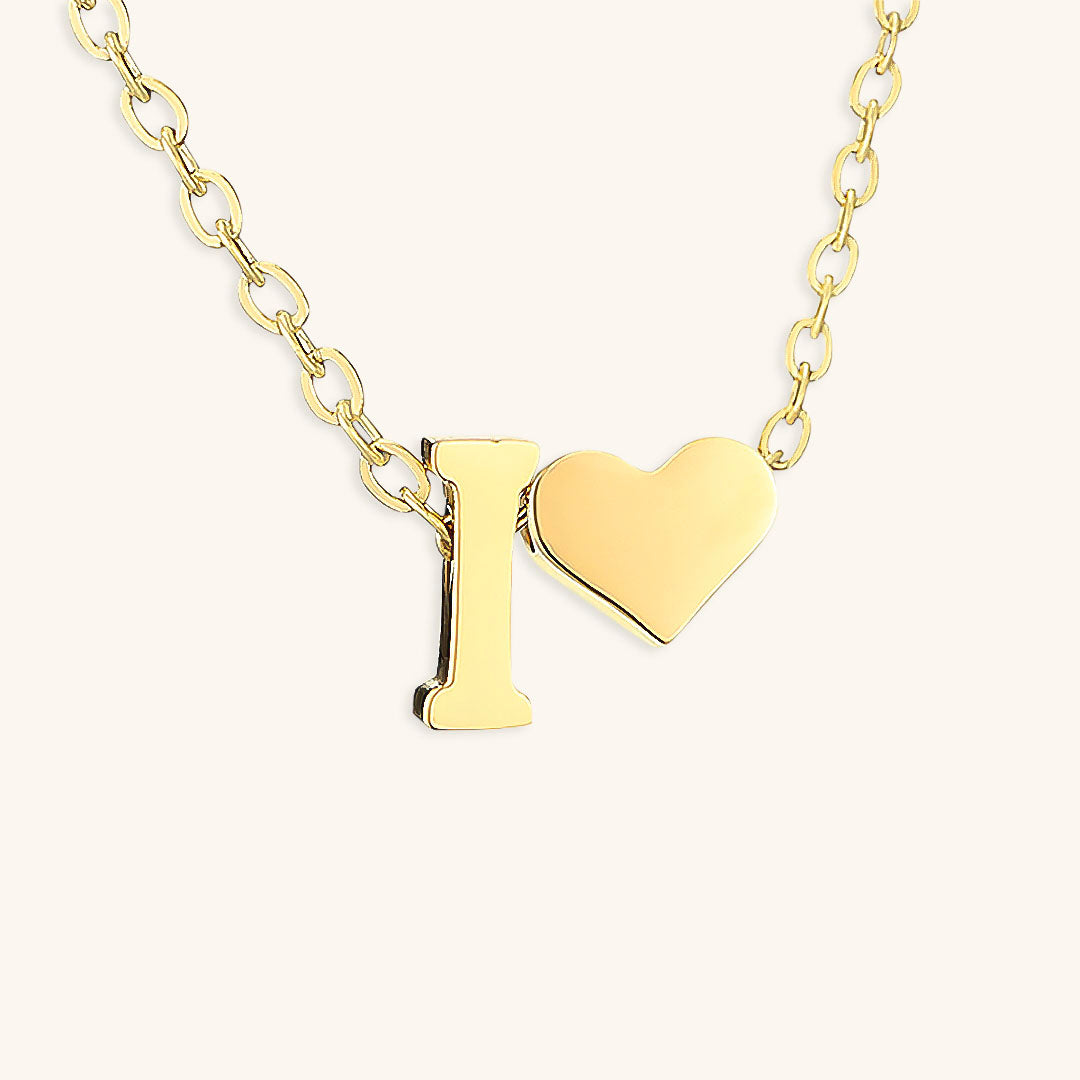 navnesmykke med initialen Ria | 18k Guld