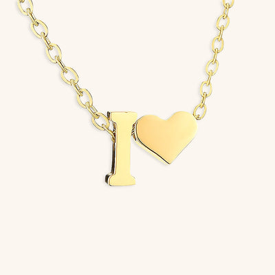 navnesmykke med initialen Ria | 18k Guld