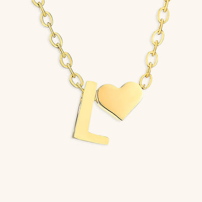 navnesmykke med initialen Ria | 18k Guld
