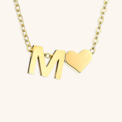 navnesmykke med initialen Ria | 18k Guld