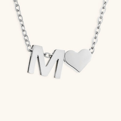 navnesmykke med initialen Ria | 18k Guld