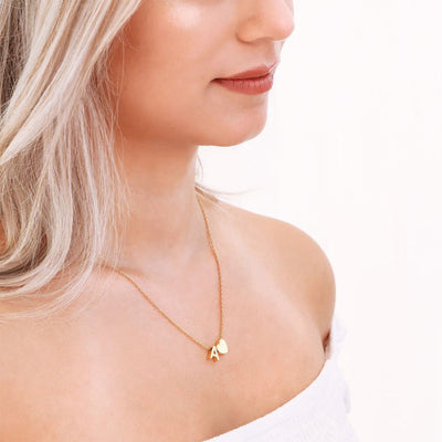 navnesmykke med initialen Ria | 18k Guld