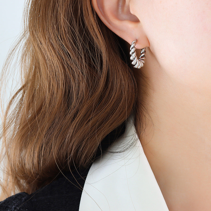 Guldøreringe Aurum Twist | 18k Guld