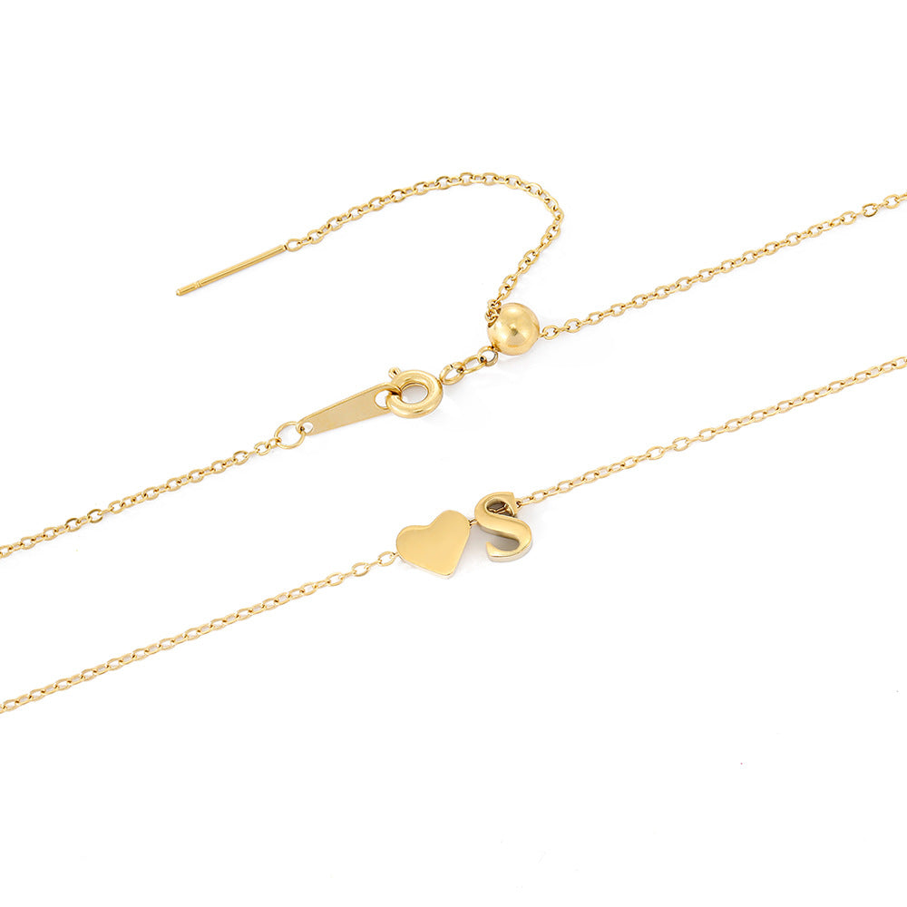 navnesmykke med initialen Ria | 18k Guld