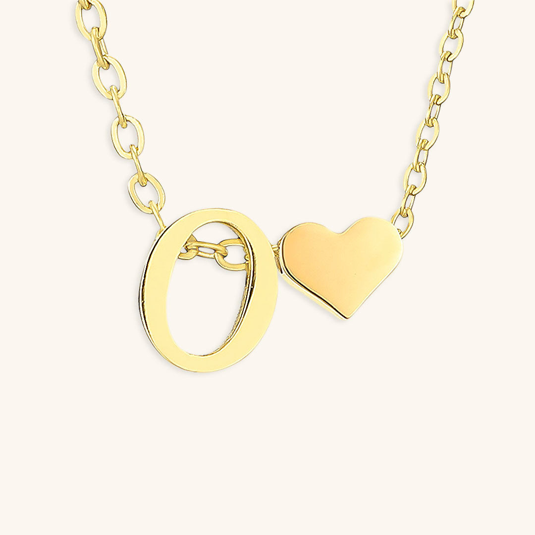 navnesmykke med initialen Ria | 18k Guld