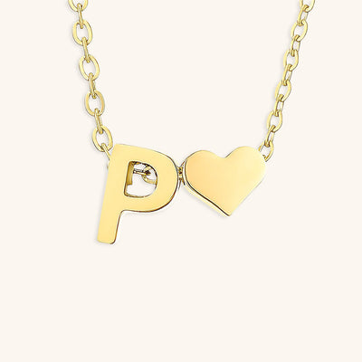navnesmykke med initialen Ria | 18k Guld