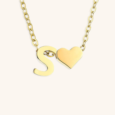 navnesmykke med initialen Ria | 18k Guld