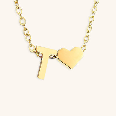 navnesmykke med initialen Ria | 18k Guld