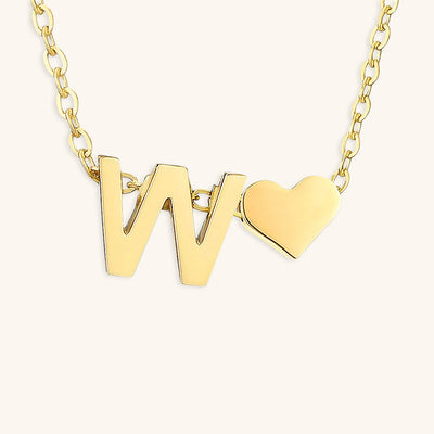 navnesmykke med initialen Ria | 18k Guld
