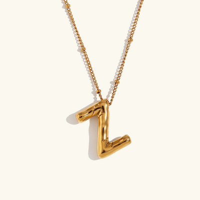 Næseørering med initialer i bobleform | Guld 18k